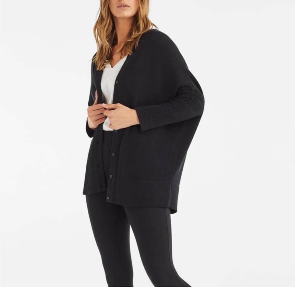 Vetta Convertible Black Oversized Sweater. Converts to a turtleneck sweater